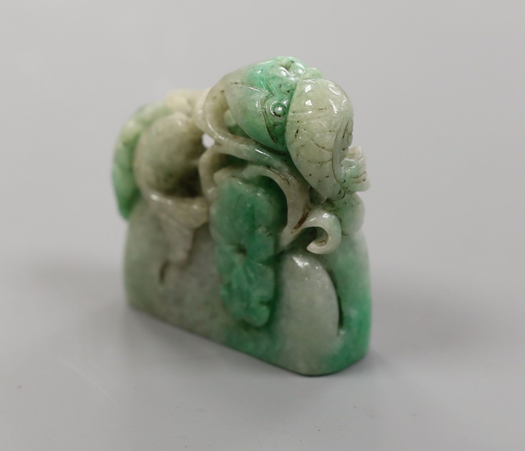 A Chinese jadeite fish and lotus carving 5.5cm